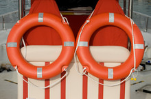 Boat With Two Lifebelt Or Lifebuoys As Equipment, Round, Orange, White Rope, To Save People In Case Of Falling Into Water And Drowning, Mediterranean, Arma Di Taggia, Liguria, Italy