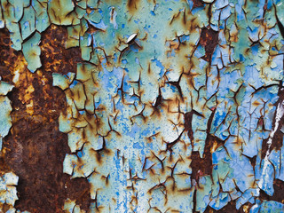 The color of the wall is scratched and rusty.