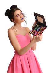 Wall Mural - The beautiful girl with brushes for make-up