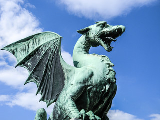 Close up image of the Dragon statue on Dragon Bridge (Zmajski Most) in Ljubljana, Solenia. 