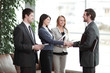 © yurolaitsalbert - close up. handshake business partners in a modern business center