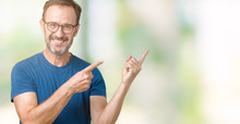 Handsome Middle Age Hoary Senior Man Wearin Glasses Over Isolated Background Smiling And Looking At The Camera Pointing With Two Hands And Fingers To The Side.