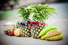 Tropical Fruit Mix On The Beach. Stylish Pineapple With Sunglasses