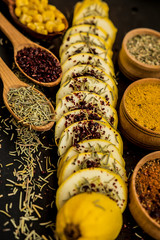 Wall Mural - squash yellow cut slices seasoning spices herbs rosemary sumac taste raw diet taste traditional ingredients wooden