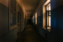 Dark Creepy Corridor Of Abandoned Hospital At Night. Horror Concept