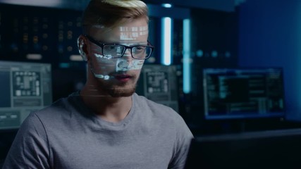 Wall Mural - portrait of software developer / hacker working on computer, projected code numbers and characters r
