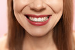 © New Africa - Smiling woman with perfect teeth, closeup view