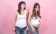 © puhimec - maternity concept, two pregnant women with an open tummy