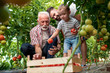 © ivanko80 - Family working together in greenhouse