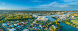 Aerial panorama of luxury real estate at Varsity Lakes suburb on Gold Coast, Queensland, Australia
