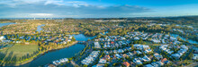 Aerial Panorama Of Luxury Suburb On The Gold Coast At Sunset.