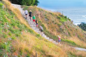 Poster - People on stone steps down track up Mount Maunganui