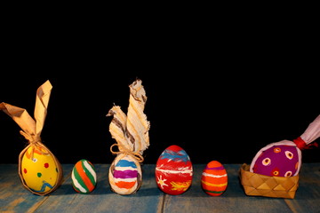 beautiful colorful, painted Easter eggs on black background 