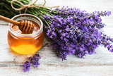 Fototapeta Lawenda - Jar with honey and fresh lavender