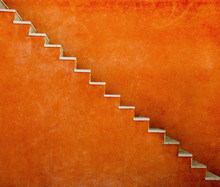 Orange Wall With Stairs Texture Background, Minimalistic Style For Base Image For Posters, Banners Or Covers, Trivial Design And Simplicity Is A Trendy Key For Graphic Arts, Acid Psychedelic Color
