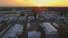 Beautiful Aerial View Of Florida Retirement Community At Sunset