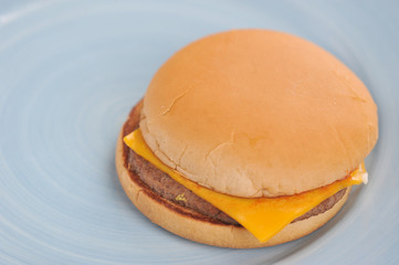 cheeseburger with cheese and ketchup