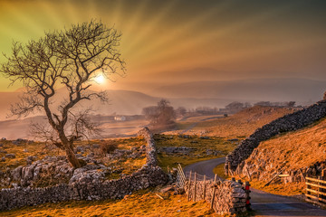 Sunset across the Yorkshire Dale from above the market town of Settle