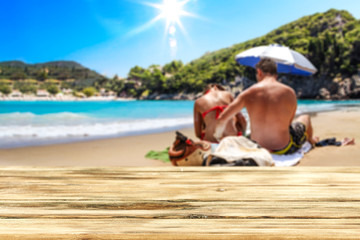 Desk of free space for your decoration. Beach landscape with two lovers on sand. Summer time. 