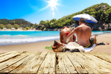 Desk of free space for your decoration. Beach landscape with two lovers on sand. Summer time. 