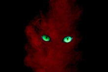 Bright Red Ghost From A Cigarette Pair With Shiny Green Eyes