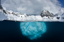 Split View Of Iceberg Above And Underwater
