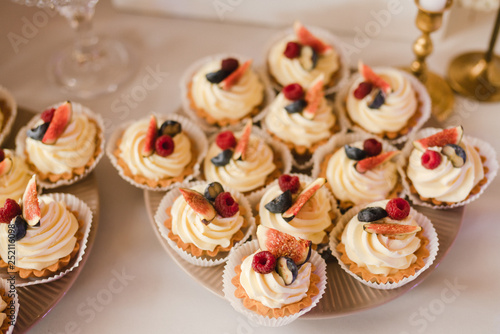 Candy Bar With Tasty Desserts And Appetizers At Wedding Reception