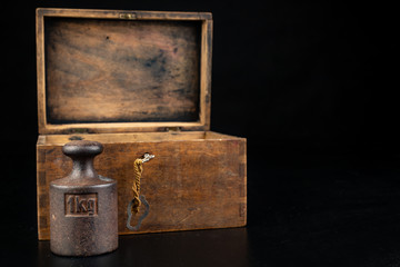 Old rusty metal weights for weighing products. Accessories for weight determination.