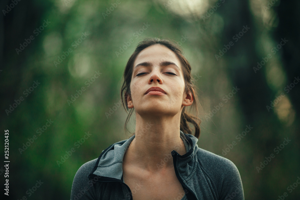Young beautiful woman exercise in the forest - obrazy, fototapety, plakaty 