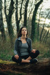 © GAGO IMAGES - Young beautiful woman exercise in the forest