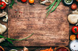 canvas print picture - Food cooking background, ingredients for preparation vegan dishes, vegetables, roots, spices, mushrooms and herbs. Old cutting board. Healthy food concept. Rustic wooden table background, top view