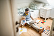 © Westend61 - Father with his little son working from home