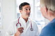© Westend61 - Portrait of doctor and talking to patient in medical practice