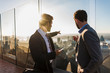 © Westend61 - USA, New York City, two businessmen on Rockefeller Center observation deck
