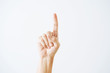 © Windawake - Number one index finger on white background.