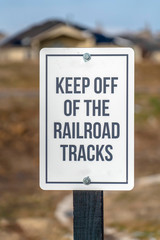 Keep Off Of The Railroad Tracks sign