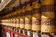 Prayer wheels in Jokhang temple. The characters (in Newari language & Tibetan) on the wheels are the mantras 