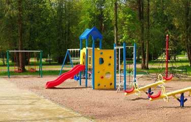 Wall Mural - An image of colorful children playground, without children. Playground without children