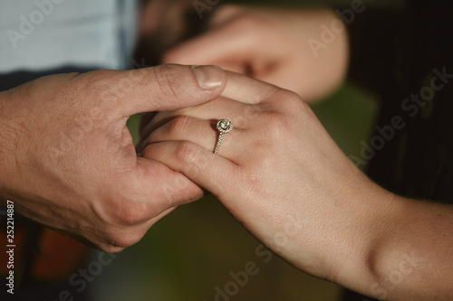 Two Lovers A Couple A Boy And A Girl Are Holding Hands The Girl On Her Hand Is A Wedding Ring The Concept Of Love Stock Photo Adobe Stock
