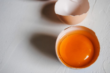 Wall Mural - Chicken eggs on a blue background