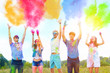 © Monstar Studio - Cheerful and happy friends soiled by bright paints jumping and laugh in colorful smoke on nature. Company of young people having fun with holi paints on spring summer festival. Holi party concept.