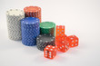 poker dice and chips on white background