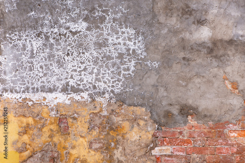 Texture Of Old Brick Wall With Yellow Plaster Canvas Print