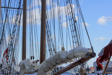 Sailing Ship In Port With Mast Down