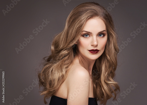 Young Brown Haired Woman With Long Curly Hair Beautiful Face Of