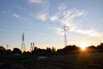 Electric poles on sunset.