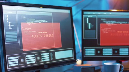 cybercrime, hacking and technology concept - female hacker in dark room creating code or using computer virus program for cyber attack