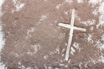 Wall Mural - Cross and ash on white background - symbol of Ash Wednesday. Copy space