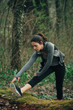 © GAGO IMAGES - Young beautiful woman exercise in the forest
