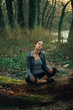 © GAGO IMAGES - Young beautiful woman exercise in the forest